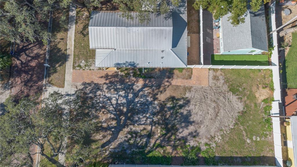 448 Locklie Street Dunedin, FL 34698 - Photo 3 of 51 a view of house with backyard