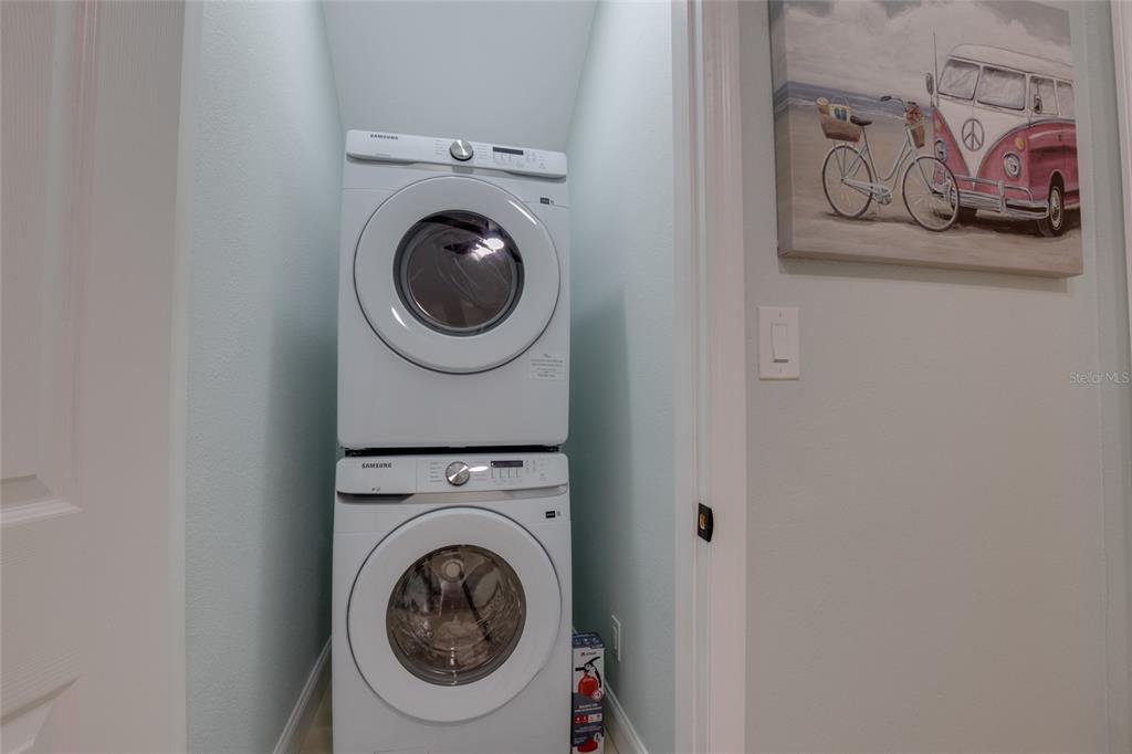 448 Locklie Street Dunedin, FL 34698 - Photo 48 of 51 a utility room with dryer and washer