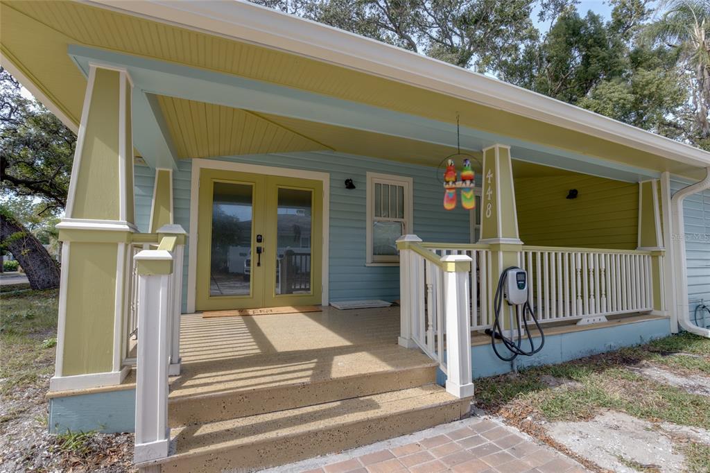 448 Locklie Street Dunedin, FL 34698 - Photo 6 of 51 a view of a entrance gate of the house
