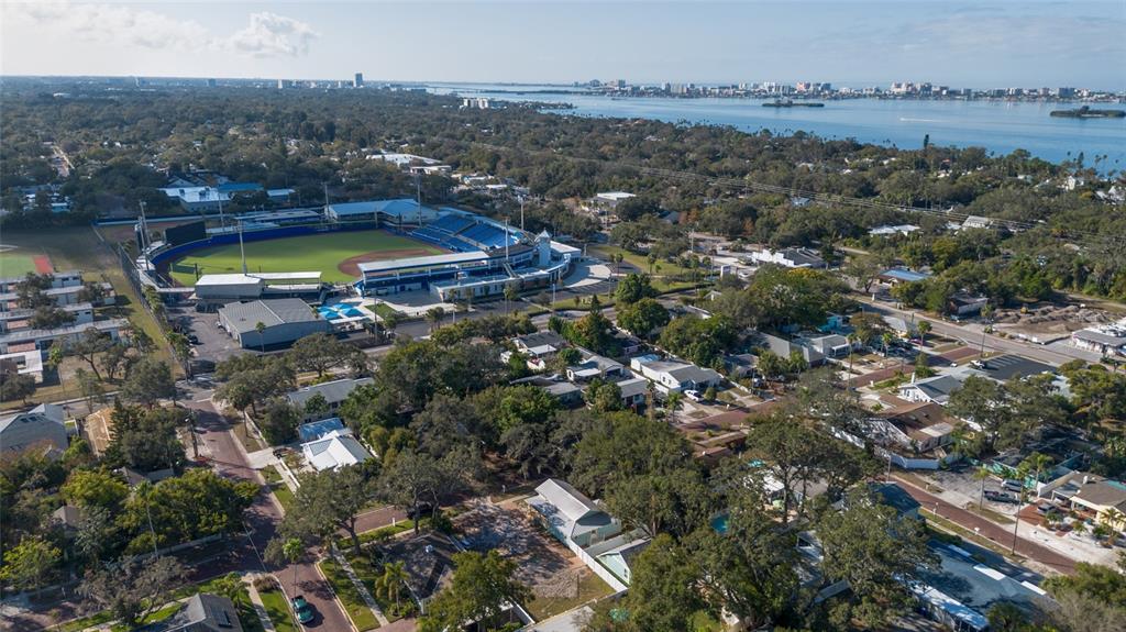 448 Locklie Street Dunedin, FL 34698 - Photo 10 of 51 an aerial view of residential house with outdoor space and lake view