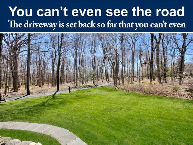288 Georgetown Road Weston, CT 06883 - Photo 1 of 1 a view of outdoor space with a garden and signage