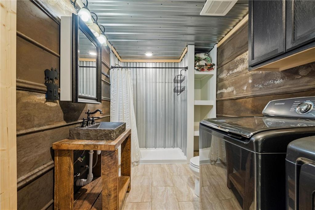 10019 Dingman Road Guys Mills, PA 16327 - Photo 13 of 50 a kitchen with a stove and a shower