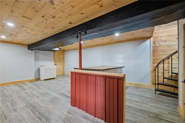 a bathroom with a toilet and shower