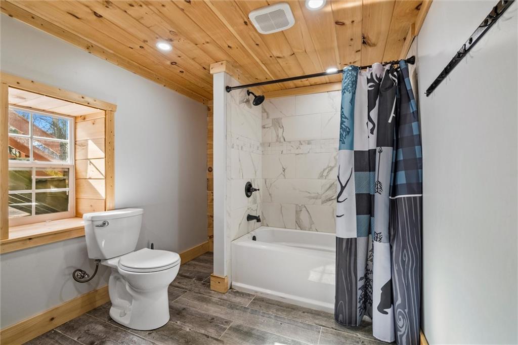 10019 Dingman Road Guys Mills, PA 16327 - Photo 20 of 50 a bathroom with a toilet and shower