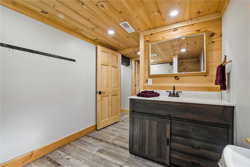 10019 Dingman Road Guys Mills, PA 16327 - Photo 21 of 50 a bathroom with a sink mirror and a shower