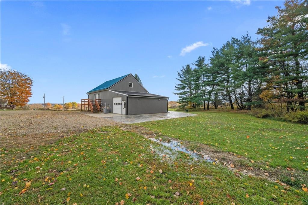 10019 Dingman Road Guys Mills, PA 16327 - Photo 32 of 50 a house view with a garden space