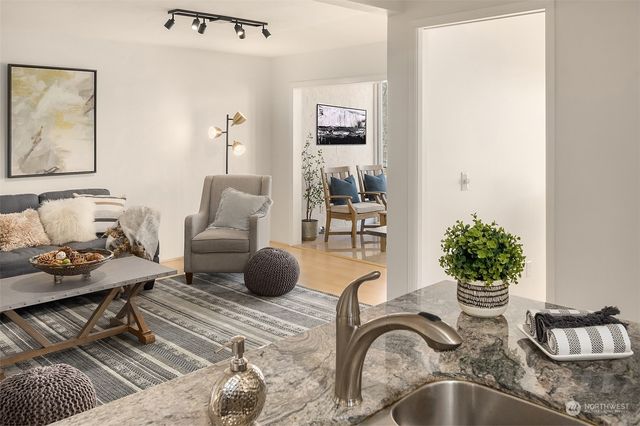 a view of a living room and dining room
