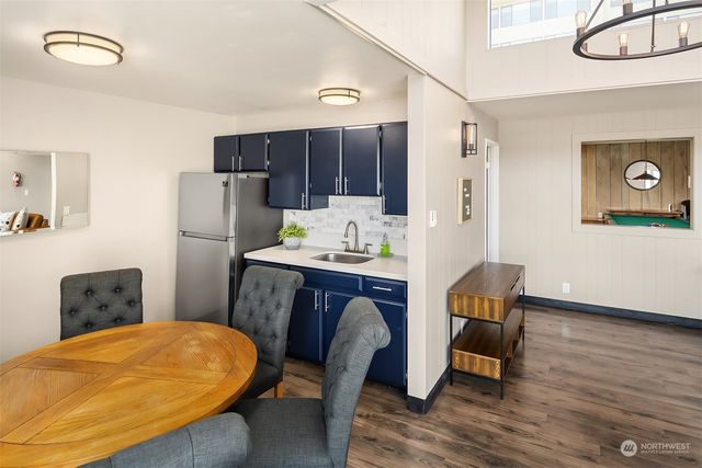 a workspace with furniture and wooden floor