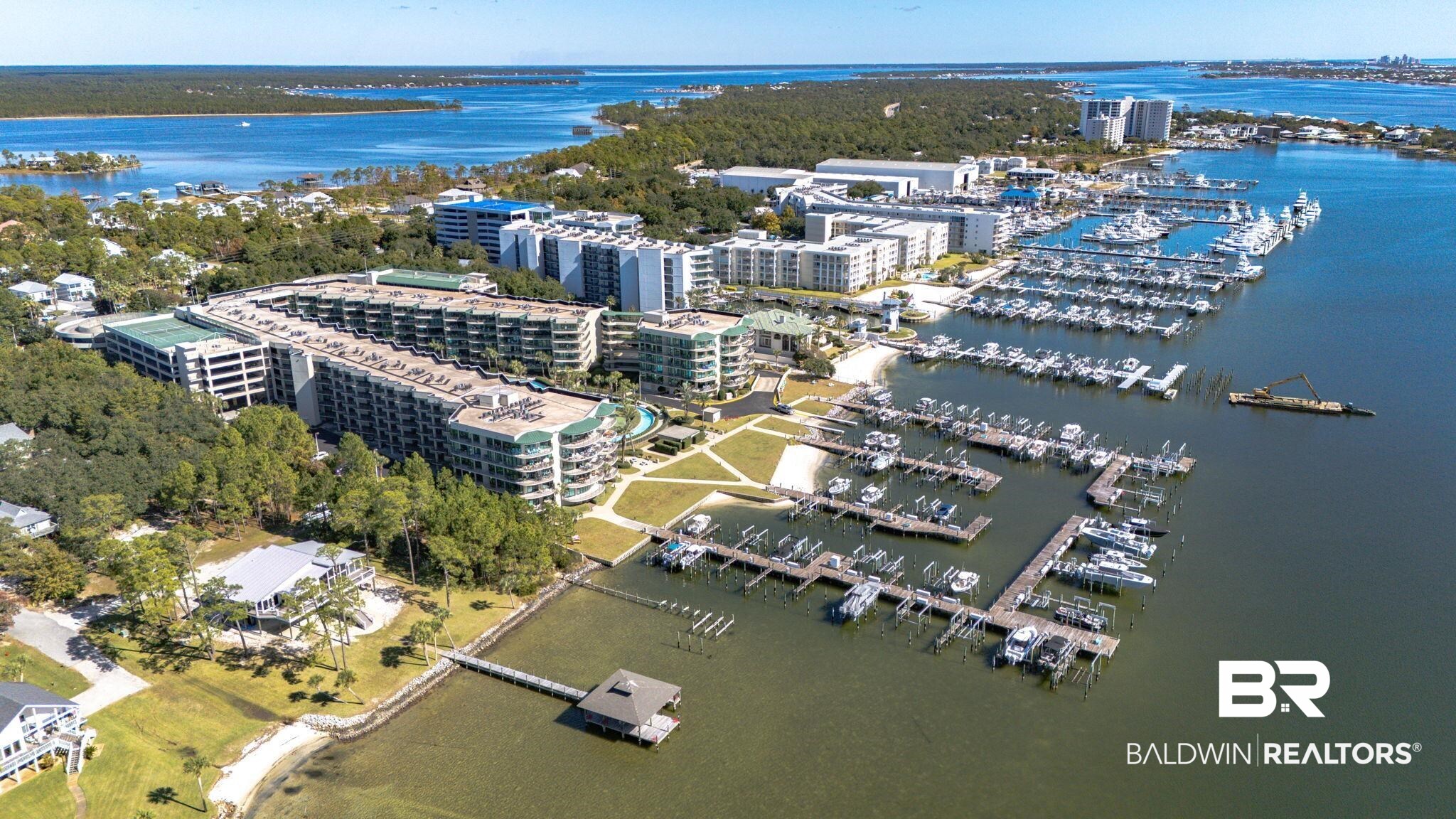 27580 Canal Road, Unit 1526 Orange Beach, AL 36561 - Photo 44 of 49 View of urban area with a large body of water and a marina