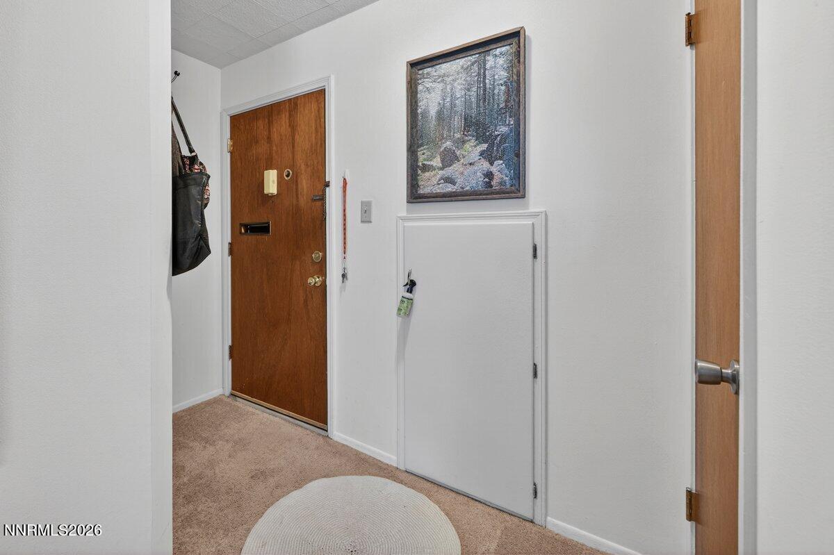 1945 4th Street, Unit 3 Sparks, NV 89431 - Photo 4 of 20 a view of a bedroom from hallway