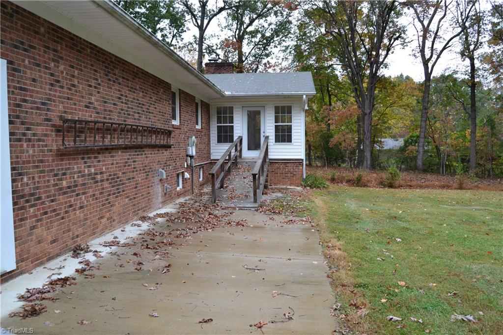 4758 Old Greensboro Road Randleman, NC 27317 - Photo 20 of 23 Sidewalk leading to Sunroom