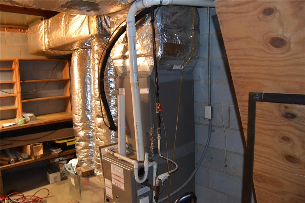 4758 Old Greensboro Road Randleman, NC 27317 - Photo 22 of 23 Workshop in unfinished basement