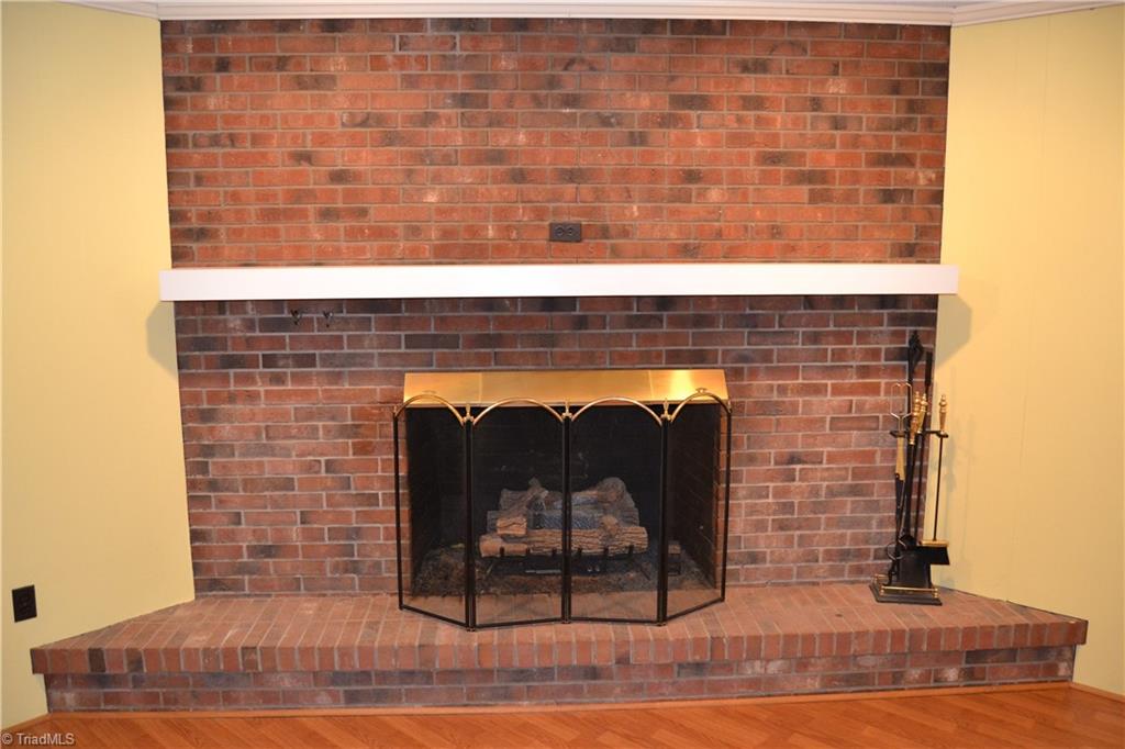 4758 Old Greensboro Road Randleman, NC 27317 - Photo 6 of 23 Gas Log Fireplace in Kitchen/Den