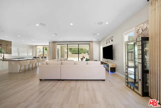 a view of kitchen with stainless steel appliances kitchen island