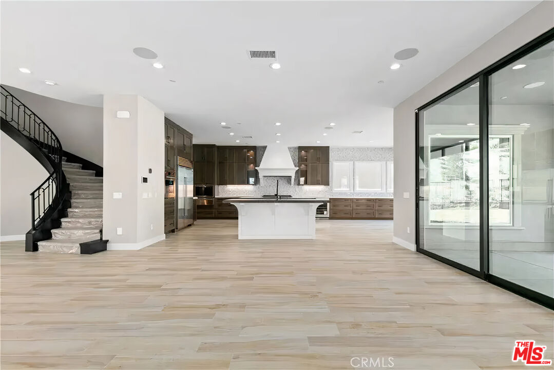 20517 Deer Grass Court Porter Ranch, CA 91326 - Photo 19 of 75 a view of kitchen with stainless steel appliances kitchen island