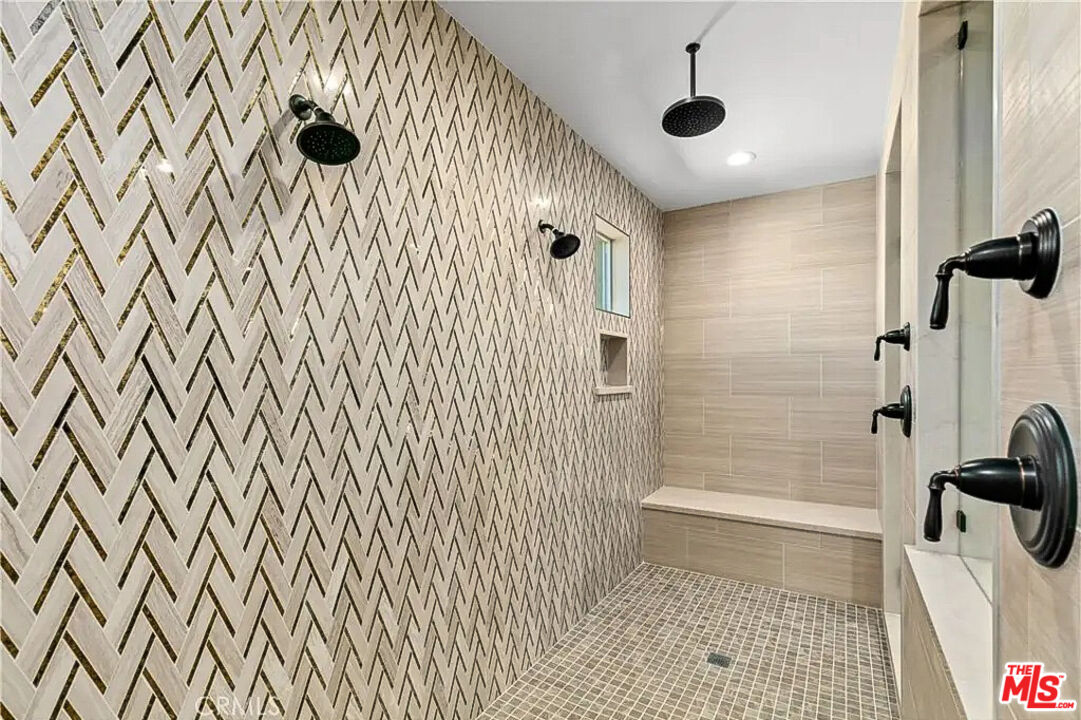 20517 Deer Grass Court Porter Ranch, CA 91326 - Photo 51 of 75 a bathroom with a bathtub and shower