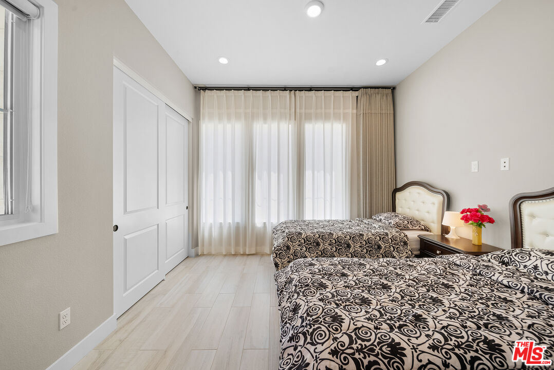 20517 Deer Grass Court Porter Ranch, CA 91326 - Photo 53 of 75 a very nice looking room with a large window