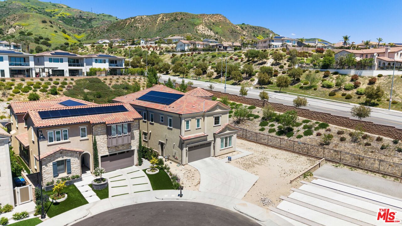 20517 Deer Grass Court Porter Ranch, CA 91326 - Photo 6 of 75 a view of a city with tall buildings