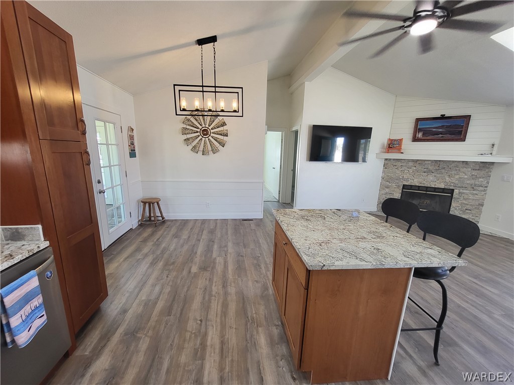 30260 Haystack Drive Meadview, AZ 86444 - Photo 12 of 52 a open kitchen with kitchen island a stove and a refrigerator