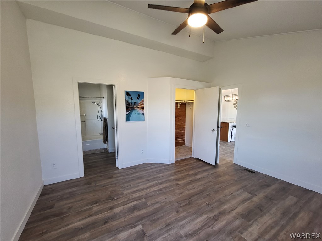 30260 Haystack Drive Meadview, AZ 86444 - Photo 17 of 52 wooden floor in an empty room with a window