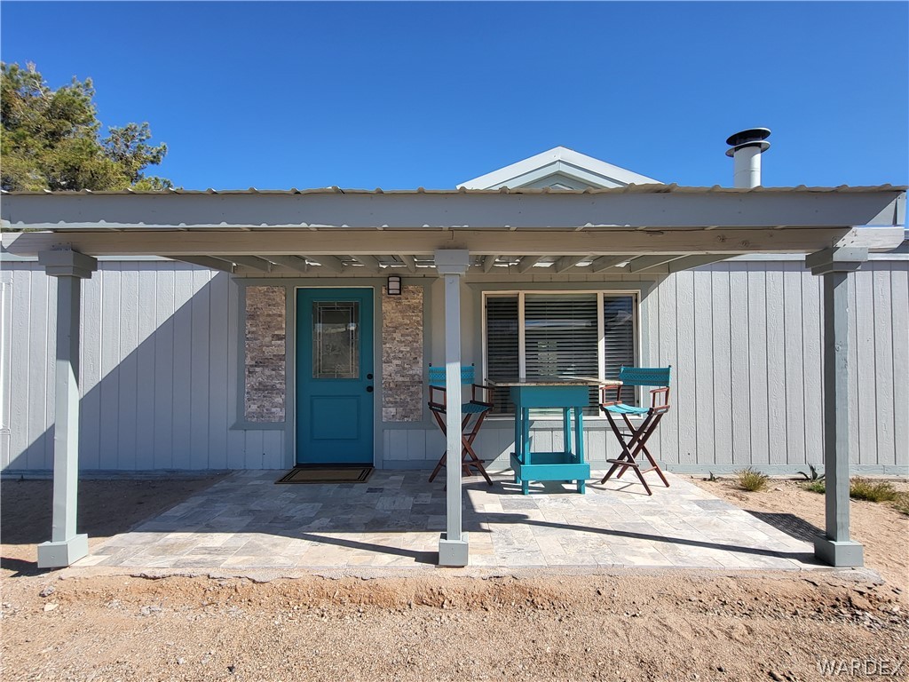 30260 Haystack Drive Meadview, AZ 86444 - Photo 2 of 52 a front view of a house with a porch