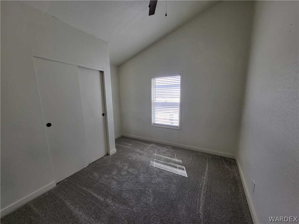 30260 Haystack Drive Meadview, AZ 86444 - Photo 21 of 52 an empty room with windows