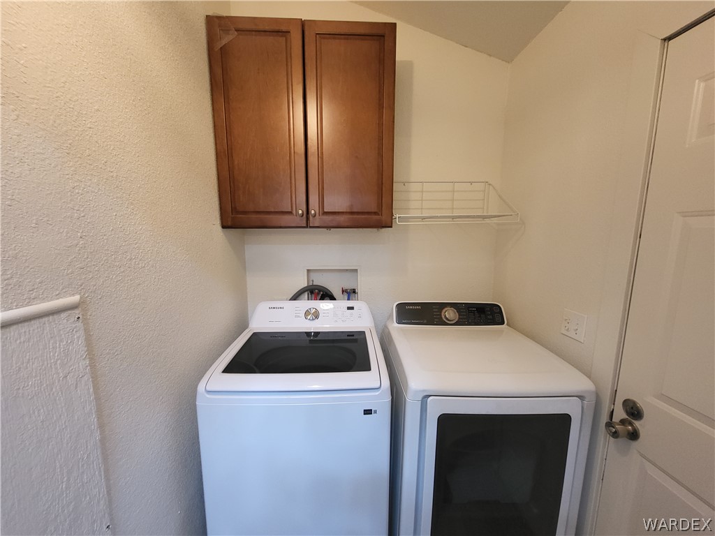 30260 Haystack Drive Meadview, AZ 86444 - Photo 26 of 52 a utility room with dryer and washer