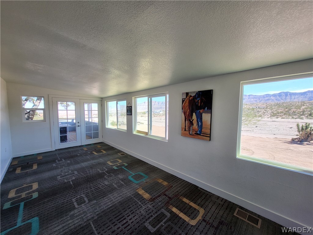 30260 Haystack Drive Meadview, AZ 86444 - Photo 27 of 52 a view of an empty room and window
