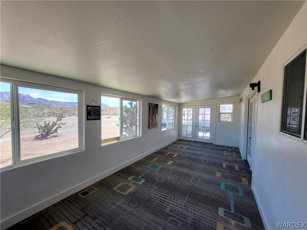 30260 Haystack Drive Meadview, AZ 86444 - Photo 28 of 52 a view of an empty room with a window