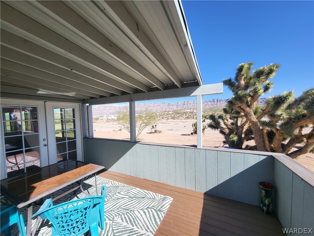30260 Haystack Drive Meadview, AZ 86444 - Photo 33 of 52 a bed room with a bed next to a window