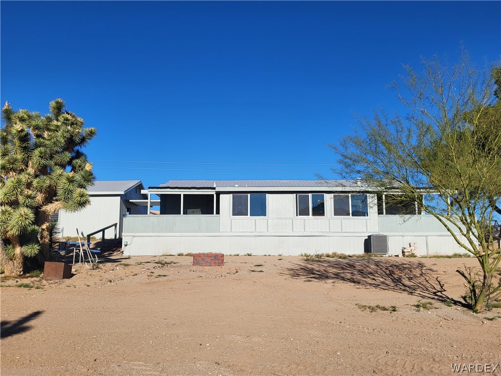 30260 Haystack Drive Meadview, AZ 86444 - Photo 40 of 52 a front view of a house with a yard