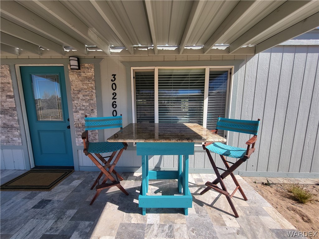 30260 Haystack Drive Meadview, AZ 86444 - Photo 4 of 52 a view of an outdoor sitting area with wooden walls