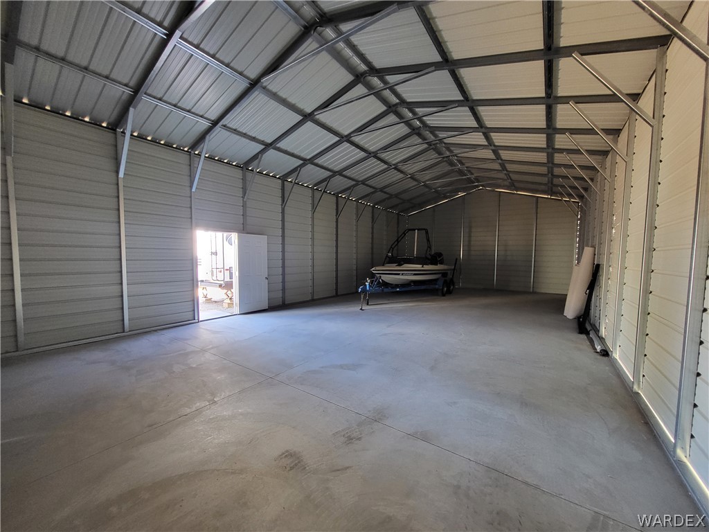30260 Haystack Drive Meadview, AZ 86444 - Photo 49 of 52 Garage featuring metal wall