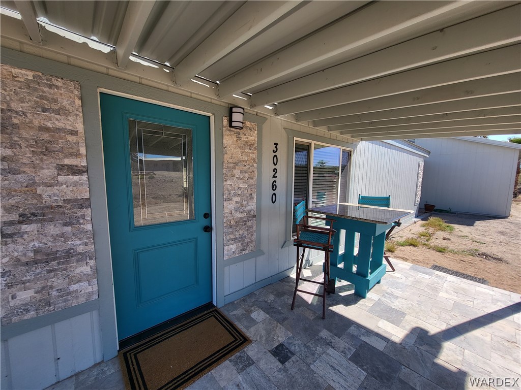 30260 Haystack Drive Meadview, AZ 86444 - Photo 5 of 52 Doorway to property with a patio