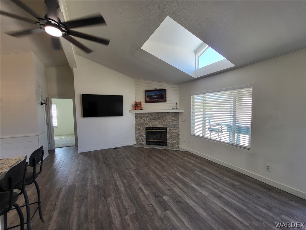 30260 Haystack Drive Meadview, AZ 86444 - Photo 7 of 52 a view of an empty room with a fireplace and a window