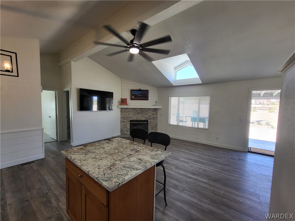 30260 Haystack Drive Meadview, AZ 86444 - Photo 10 of 52 a kitchen with a stove and a fireplace