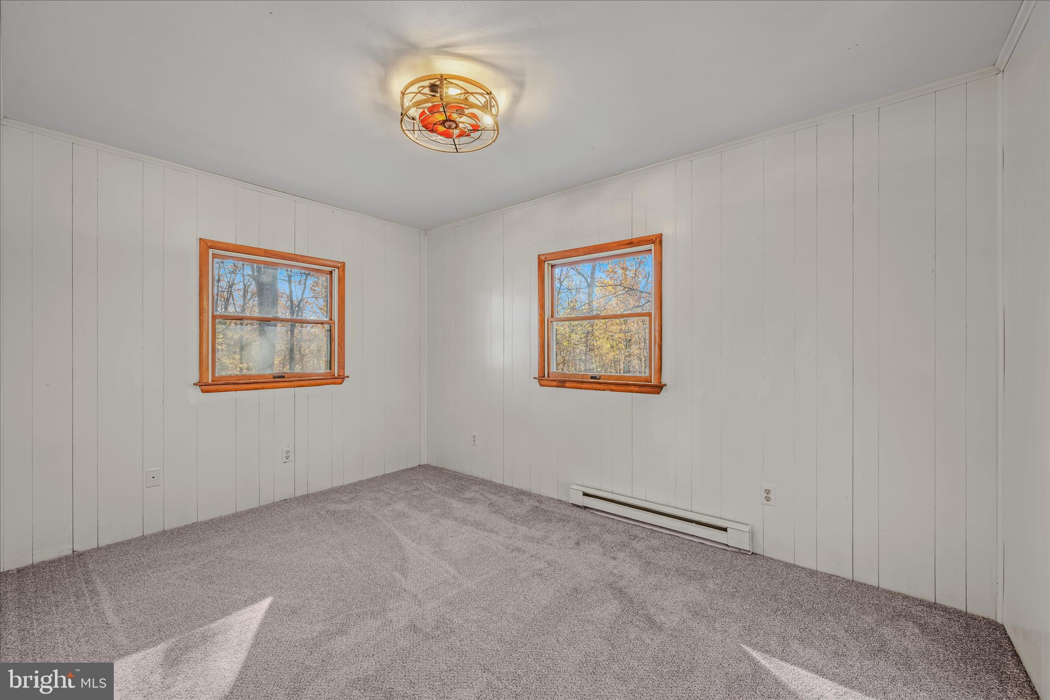 438 Gloyd Lane Great Cacapon, WV 25422 - Photo 11 of 30 a view of a hallway with a painting on the wall