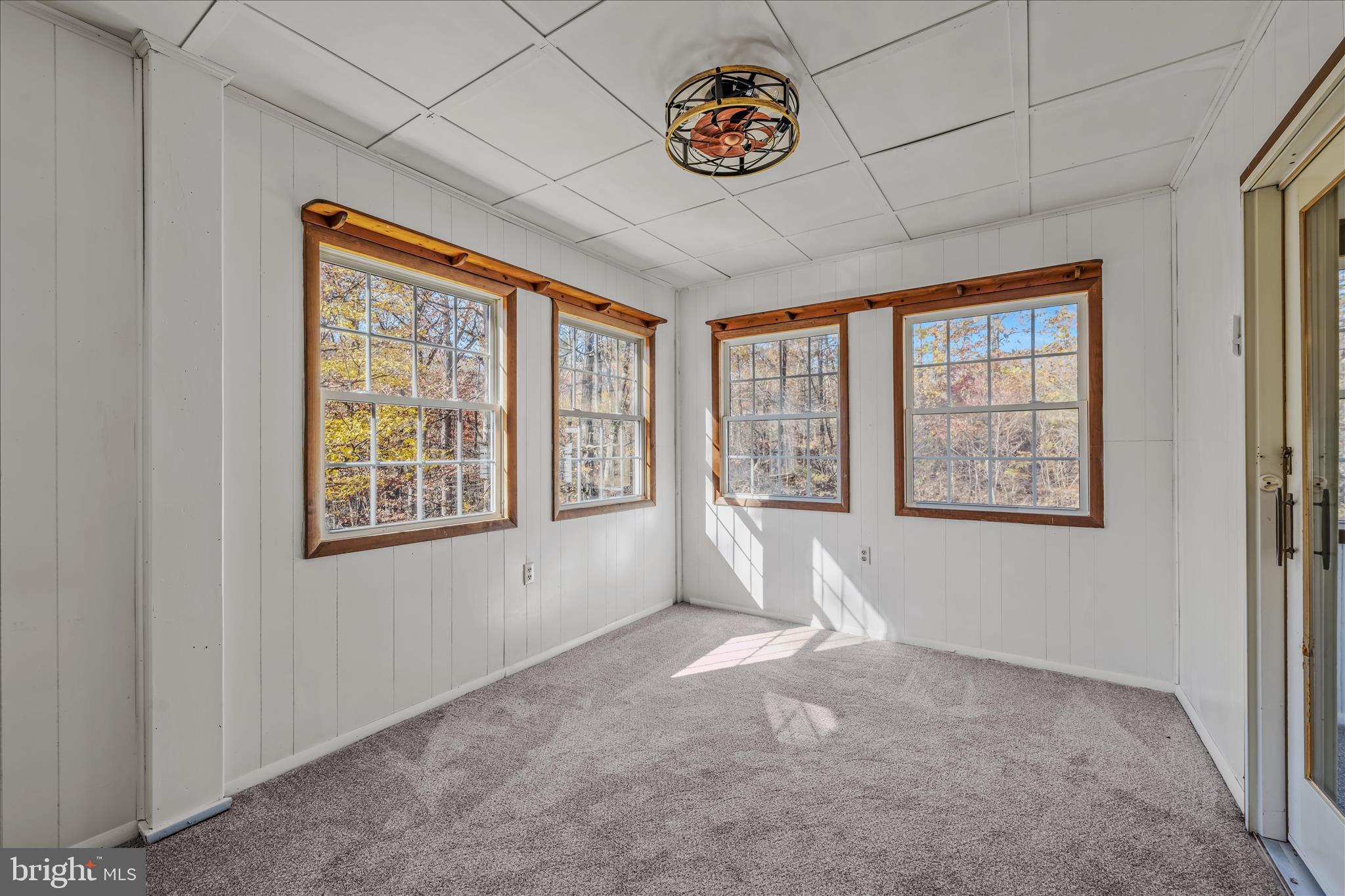438 Gloyd Lane Great Cacapon, WV 25422 - Photo 17 of 30 a view of an empty room with a window