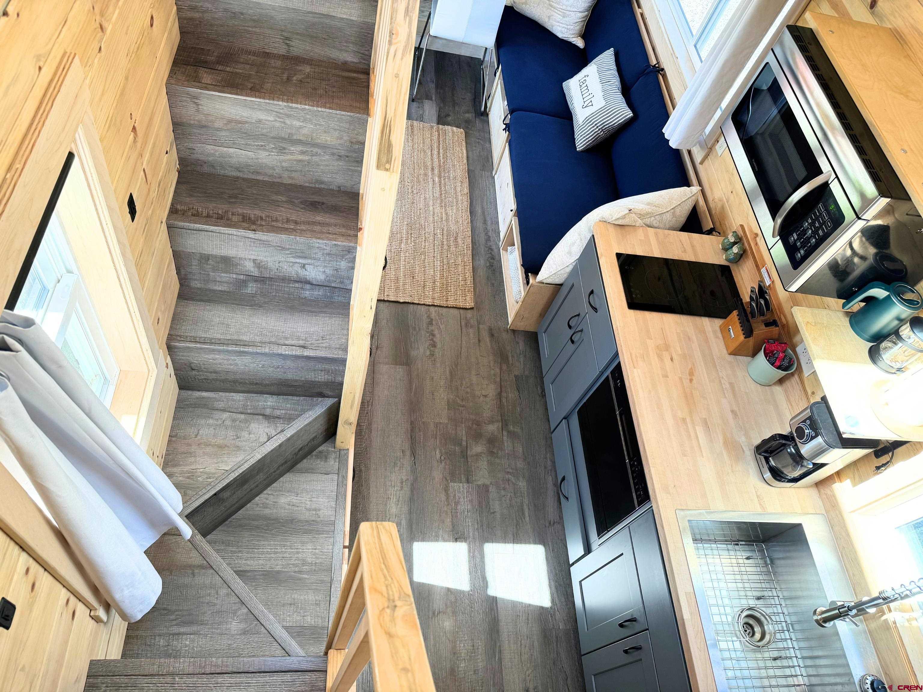 22130 6850 Road, Unit 214 Montrose, CO 81403 - Photo 12 of 26 a view of living room with a fireplace