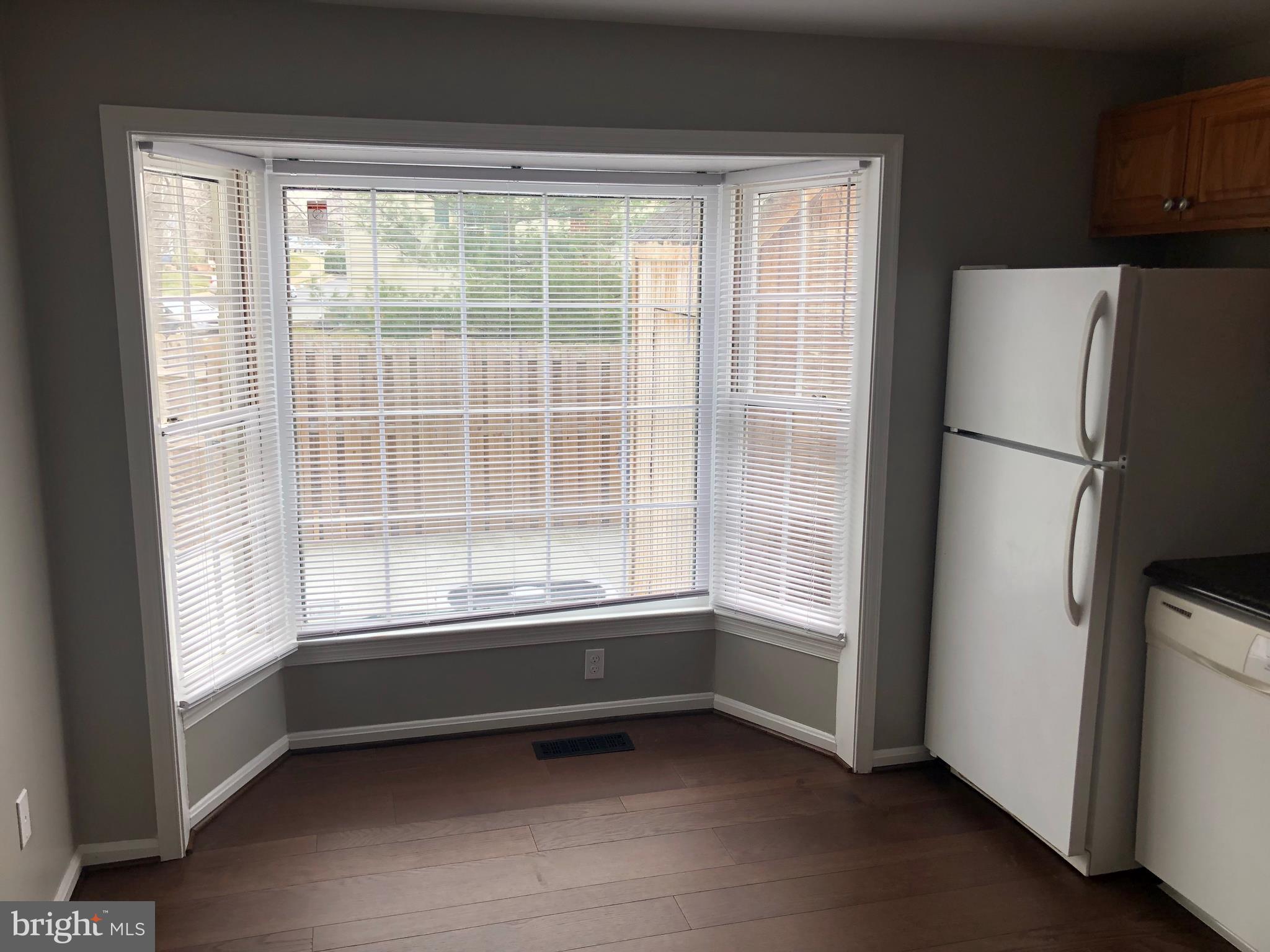138 Sharpstead Lane Gaithersburg, MD 20878 - Photo 3 of 7 Kitchen with Bay Window and new Hardwood Floors