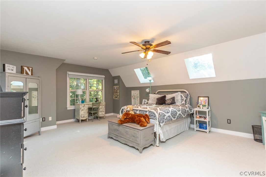 14302 Huntgate Woods Road Midlothian, VA 23112 - Photo 23 of 50 a bedroom with a bed couch and window