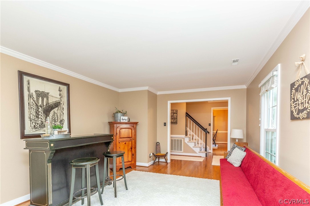 14302 Huntgate Woods Road Midlothian, VA 23112 - Photo 29 of 50 a living room with furniture and a window