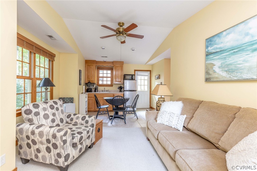 14302 Huntgate Woods Road Midlothian, VA 23112 - Photo 36 of 50 a living room with furniture and a large window