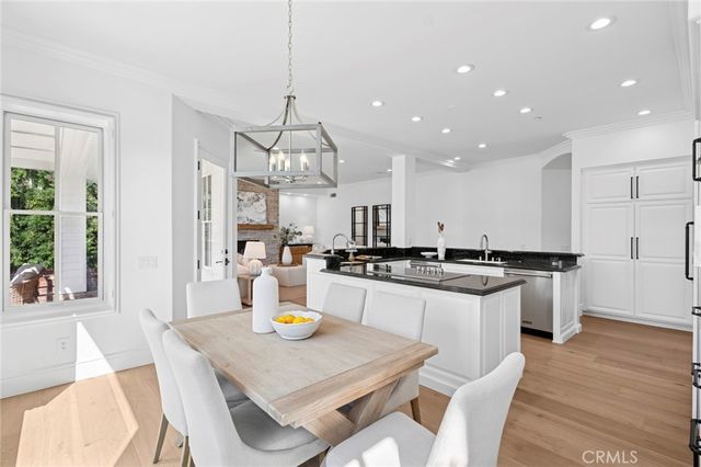 a view of a patio with swimming pool and outdoor seating