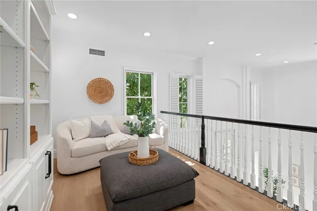 a spacious bedroom with a large bed and a fireplace