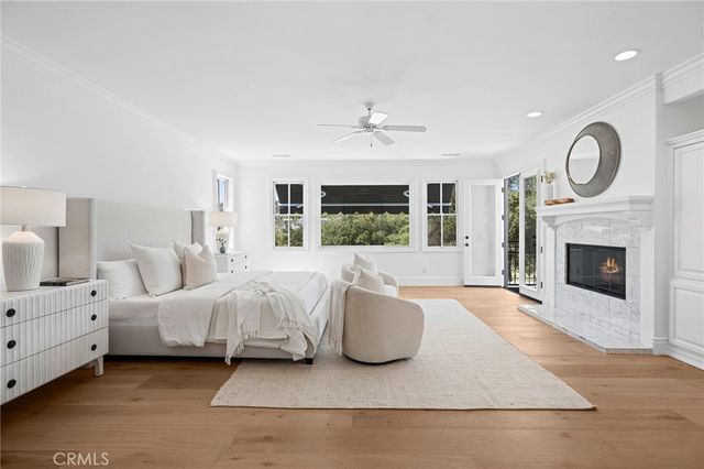 a view of a balcony with couches table and chairs