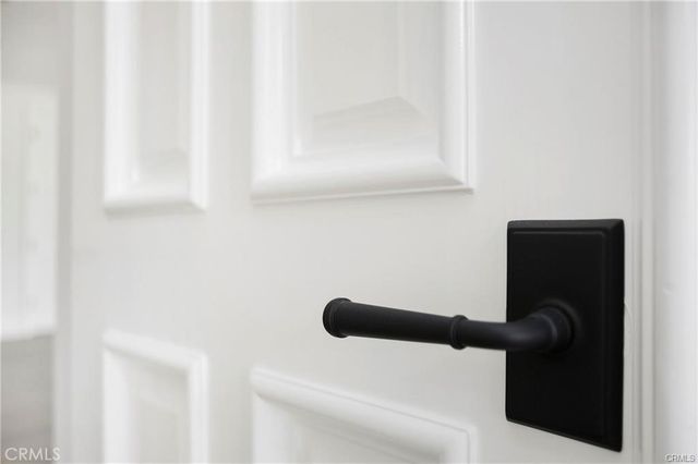 a view of a patio with a table chairs and backyard