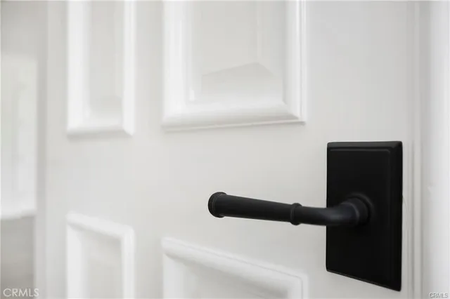 a view of a patio with a table chairs and backyard