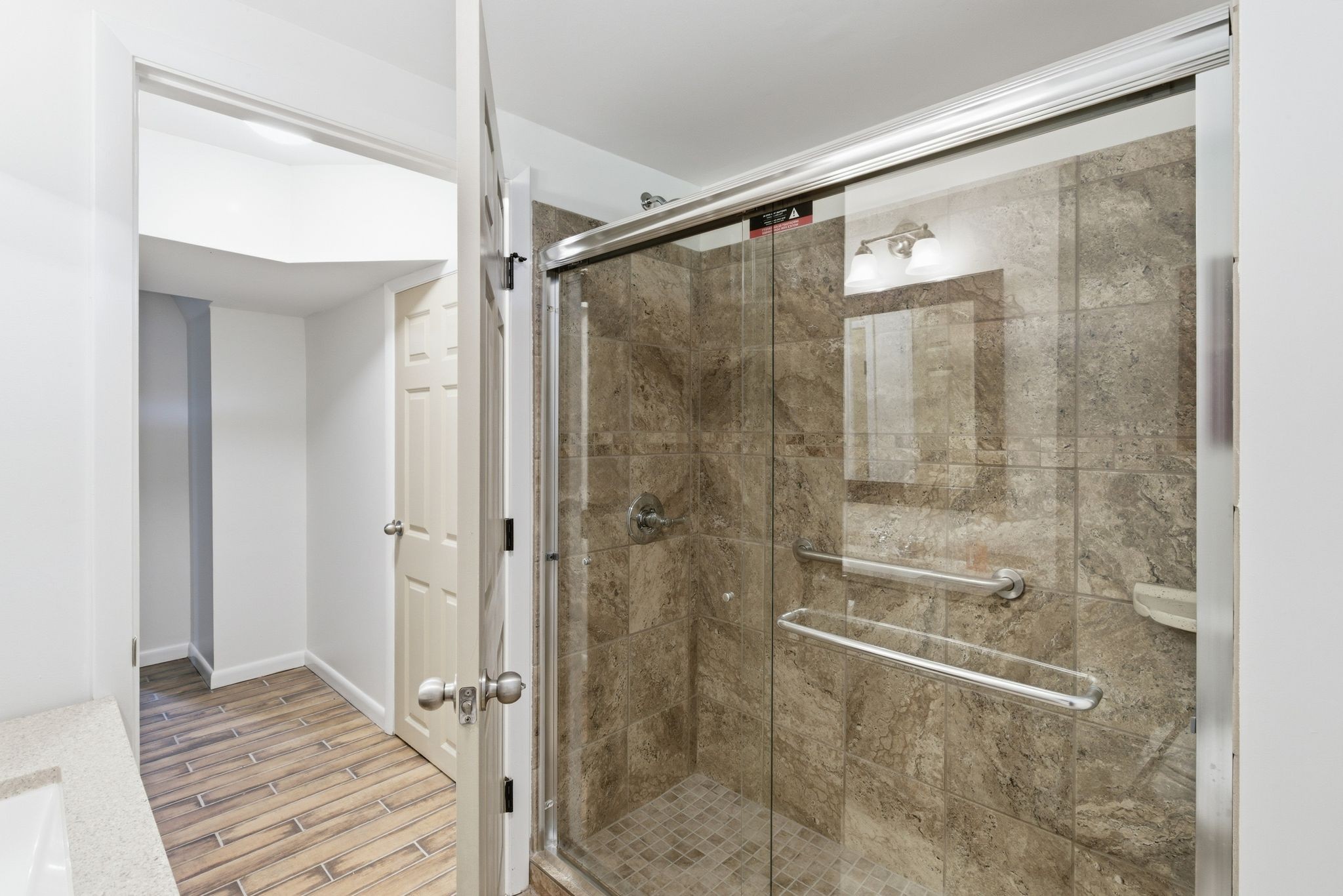 213 Rising Sun Lane Old Hickory, TN 37138 - Photo 26 of 37 a bathroom with a glass shower door