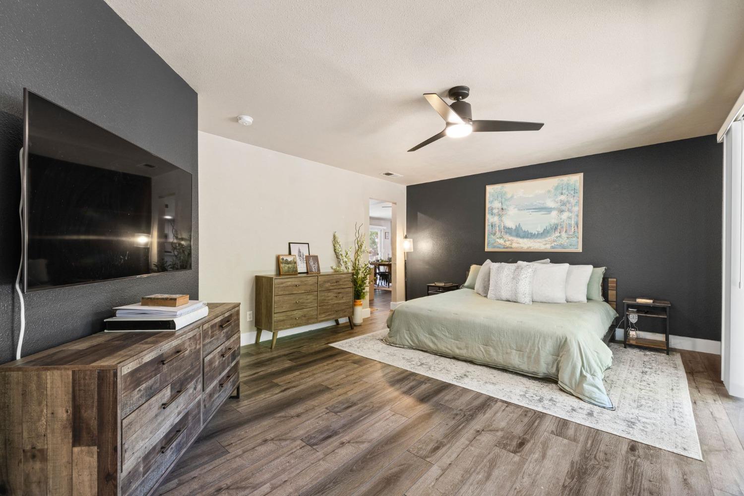 4842 Northern Lights Road Placerville, CA 95667 - Photo 13 of 26 a bedroom with a bed and a flat screen tv